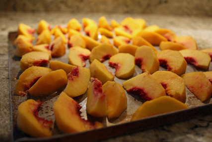 peaches on cookie sheet